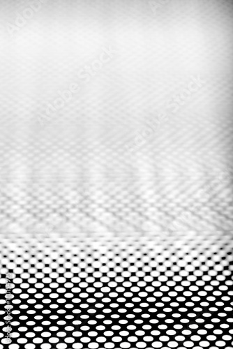 Metallic object, dotted background texture