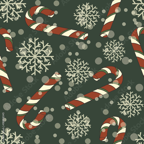 Candy cane vector seamless pattern isolated on green. Merry Christmas and Happy New Year design in traditional style. Children's Traditional sweets for New Year.