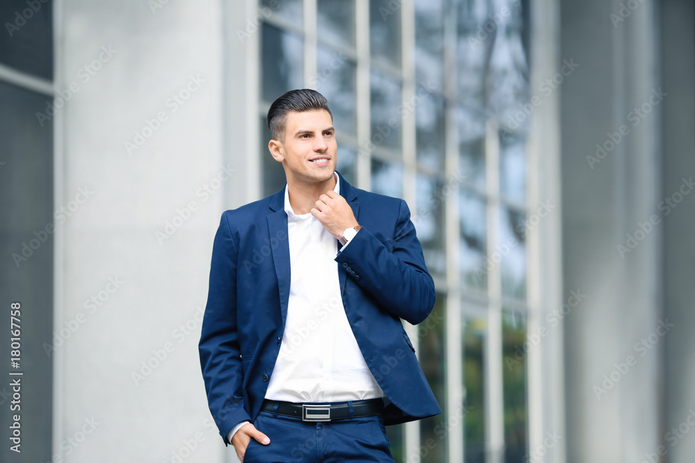 Attractive man in formal suit on city street Attractive man in formal suit on city street