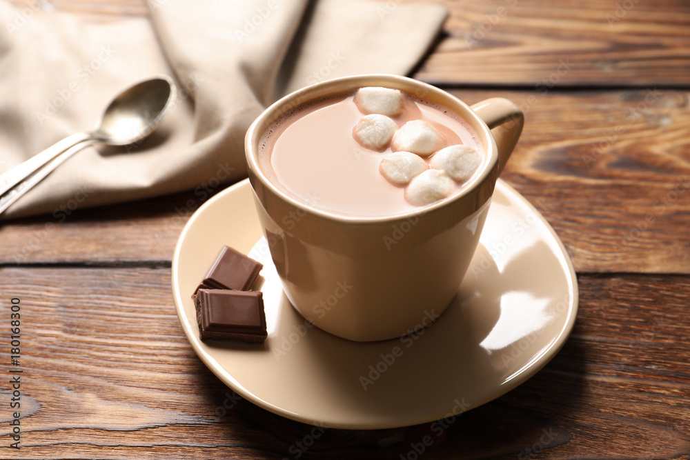 Delicious cocoa drink with marshmallows on table Delicious cocoa drink with marshmallows on table