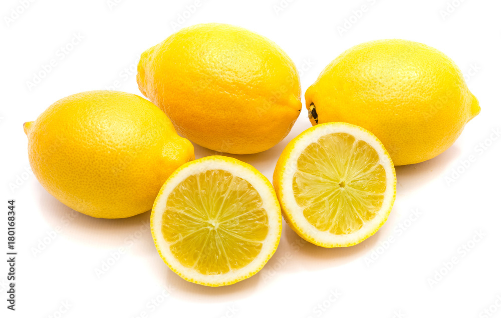 Group of three whole yellow lemons and two halves isolated on white background.
