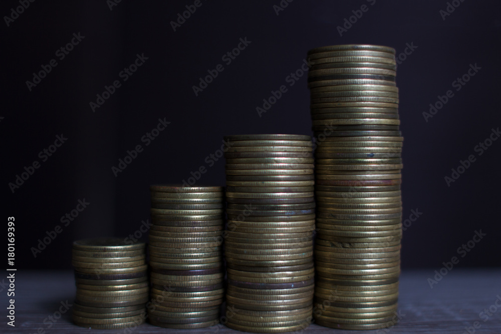 Coin stacks - stacking money as concept for success or savings, investment and accounting. Coin stacks - stacking money as concept for success or savings, investment and accounting.