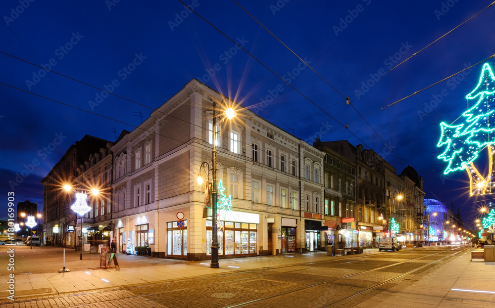 Fototapeta premium The street in Katowice decorated by christmas lights