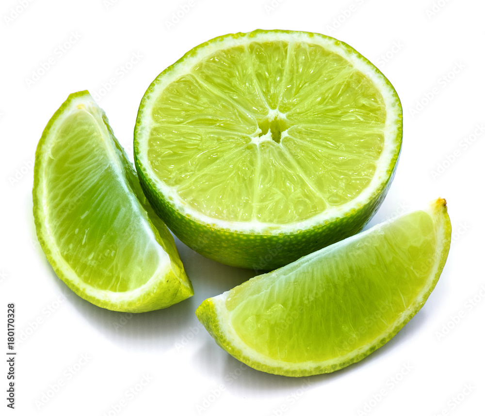One lime half and two slices isolated on white background.