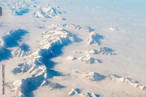 aerial view of snowy alps range  during winter season