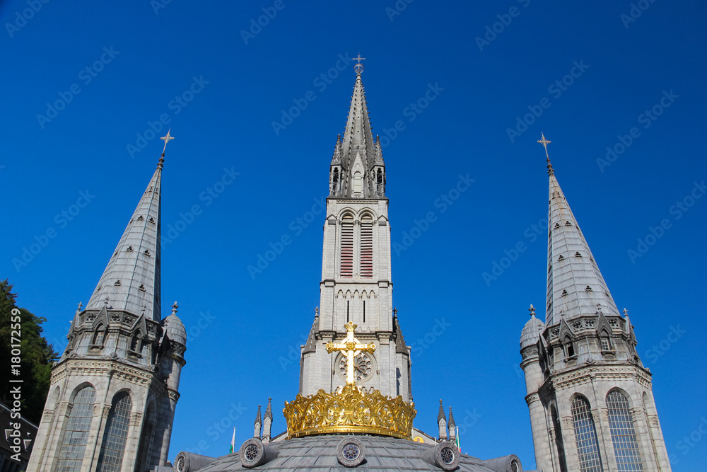 The gilded crown of the Lourdes Basilica