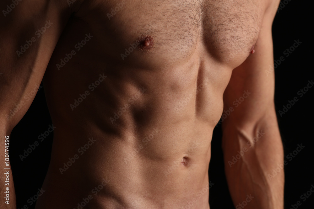 Strong Athletic Man muscular body, torso six pack abs, perfect male abdominal muscles close up. Sport, bodybuilding, crossfit concept Strong Athletic Man muscular body, torso six pack abs, perfect male abdominal muscles close up. Sport, bodybuilding, crossfit concept