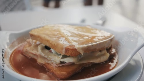 homemade francesinha, portuguese sandwich in cafe, traditional food photo