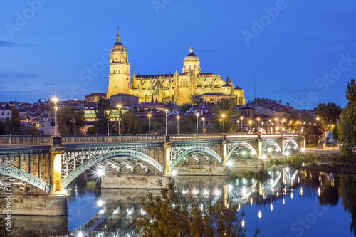 Cathedral of Salamanca and bridge over Tormes river, Spain photo