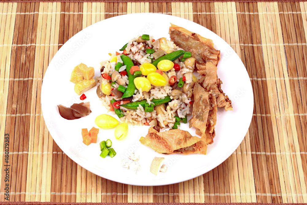 Colorful Fried rice with mixed vegetable served Colorful Fried rice with mixed vegetable served