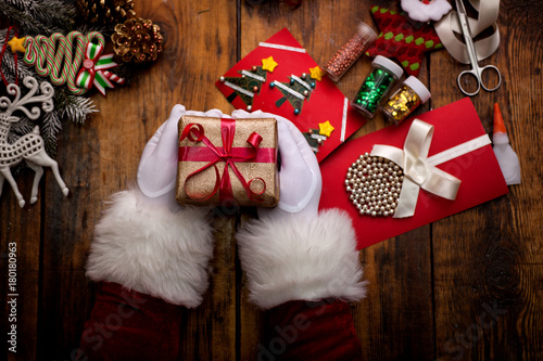 Santa's hands, make a wish list for Christmas night