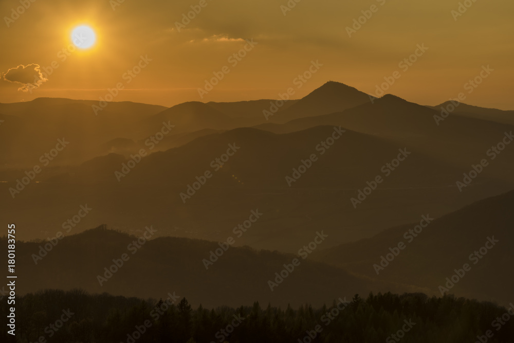 Sunset evening on Varhost hill in Ceske Stredohori mountains