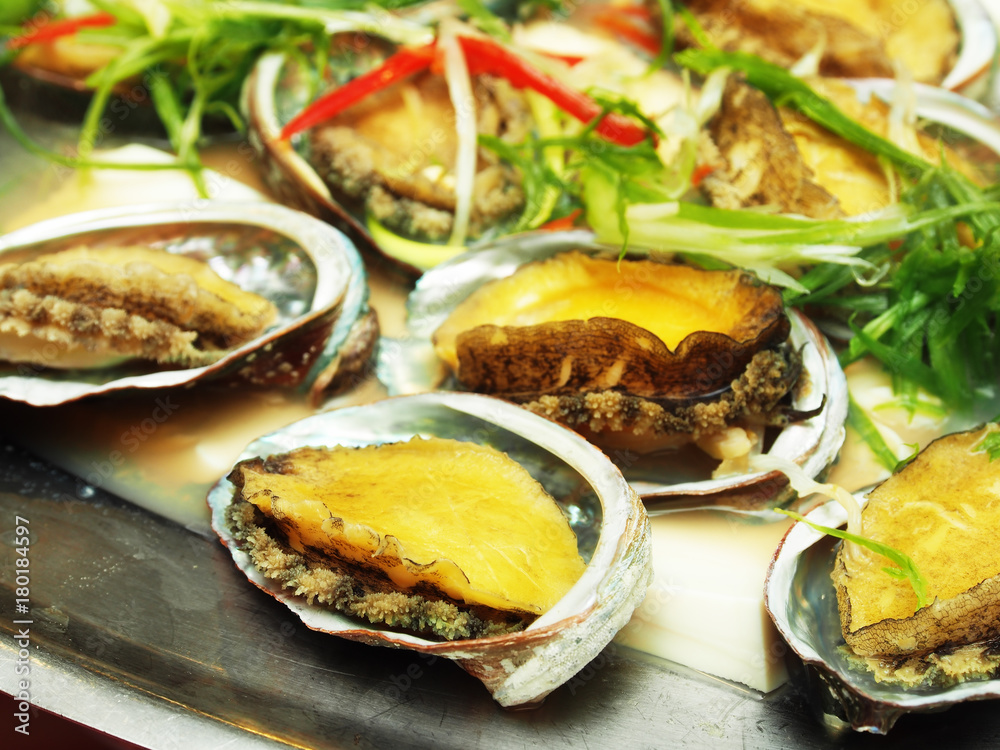 Closeup of steamed small abalone Closeup of steamed small abalone