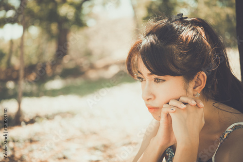 Close up sad beautiful asian woman from unrequire love,she think so much about boyfriend,life without love photo