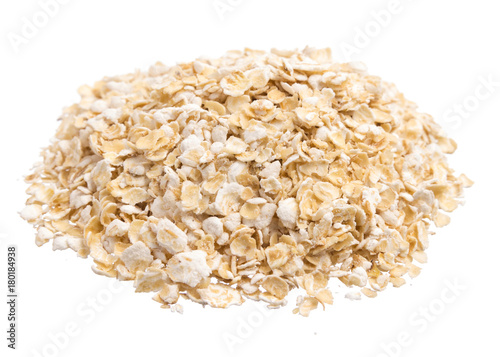 Oat Cereal. Pile of grains, isolated white background. photo