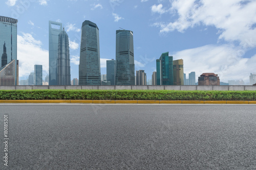 empty asphalt road front of modern buildings.