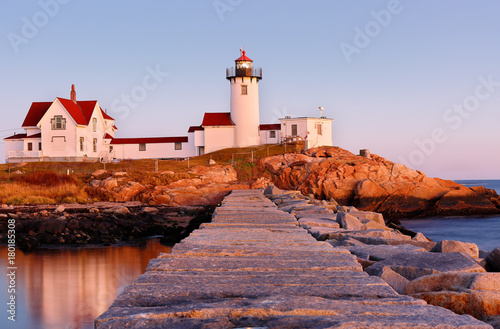 Beautiful sunset of Eastern Point Lighthouse at Gloucester, Massachusetts, USA. The Lighthouse is One of Five iconic lighthouses along the Cape Ann coastline.