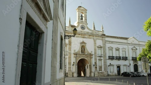 Entrance to old town of Faro, Arco da Villa tourists on excursions.