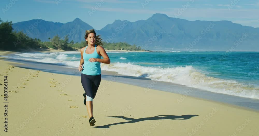 Woman Running on the Beach