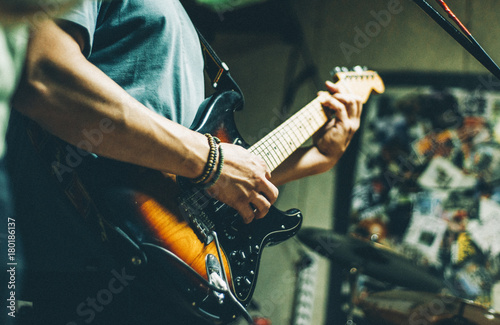 Photography man playing electric guitar