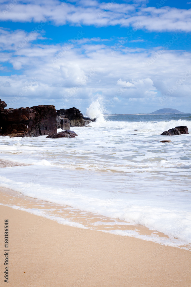 Mooloolaba Beach surf and rocks, Queensland, Australia Mooloolaba Beach surf and rocks, Queensland, Australia