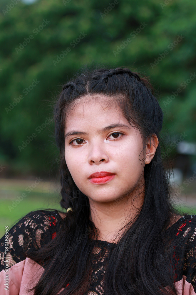 A young pretty teenager filipina Stock Photo | Adobe Stock