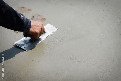 Canvas Print Builder worker plastering concrete cement floor