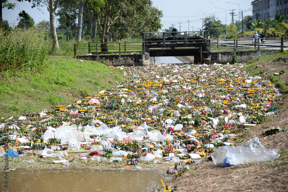 Water Pollution in rural river after Loy Krathong Festival in thailand