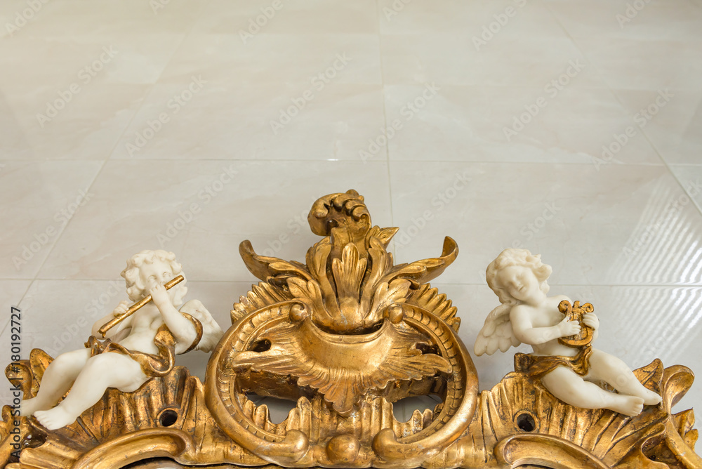 Fototapeta premium Cupid statue isolated on white background