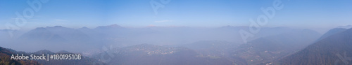 Morning landscape on hills and mountains with humidity in the air and pollution