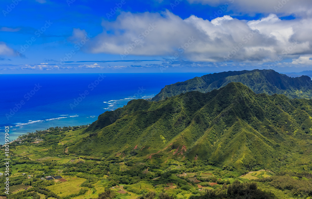 Aerial view of Oahu coastline and mountains in Honolulu Hawaii
