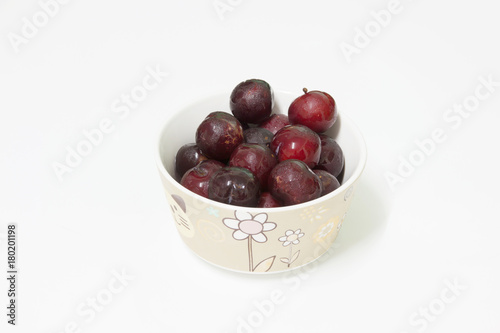 cherry in ceramic bowl