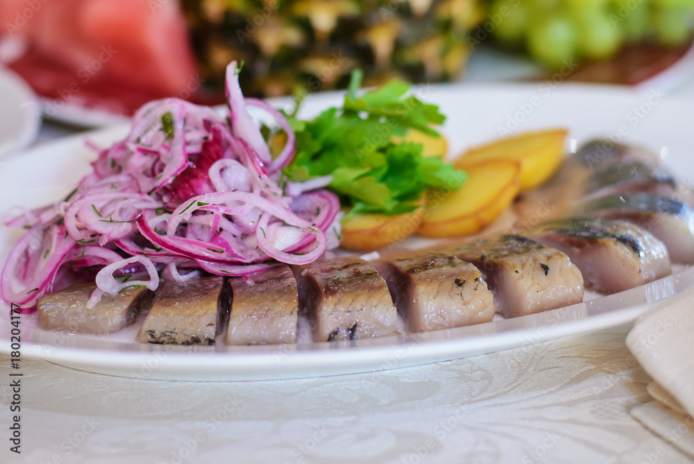 Dish with herring and onion