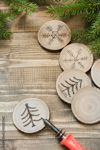 Christmas or New Year homemade pyrography toys. photo