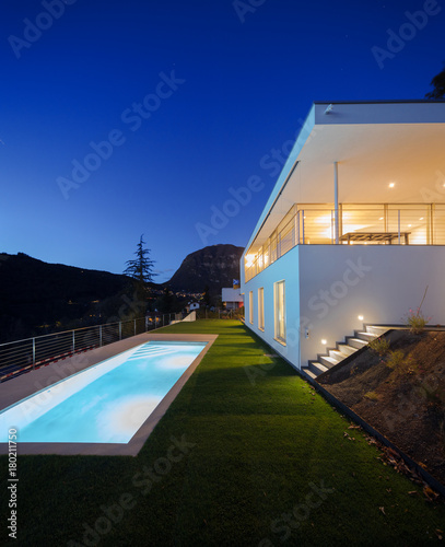 Modern villa  exterior in the night  lights on