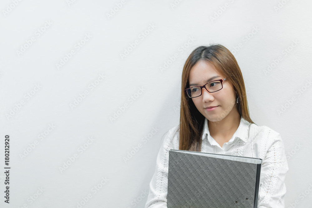 Asian girl wearing glasses with document file on white background,Thai business woman Asian girl wearing glasses with document file on white background,Thai business woman