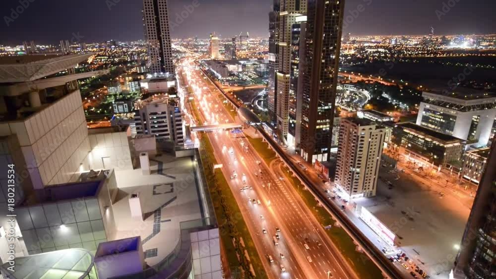 Dubai, UAE. Sheikh Zayed Road at night with city heavy traffic. Dubai, UAE. Sheikh Zayed Road at night with city heavy traffic.