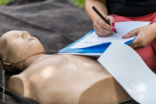 Valokuva Cpr training outdoors. Reanimation procedure on CPR doll