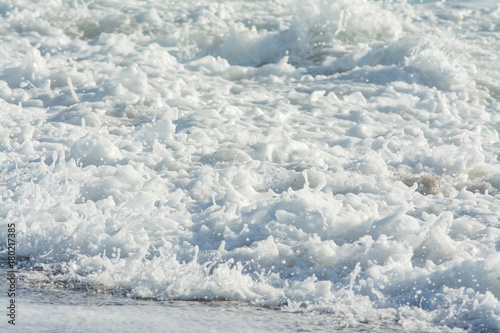 mediterranean sea waves breaking background, green water