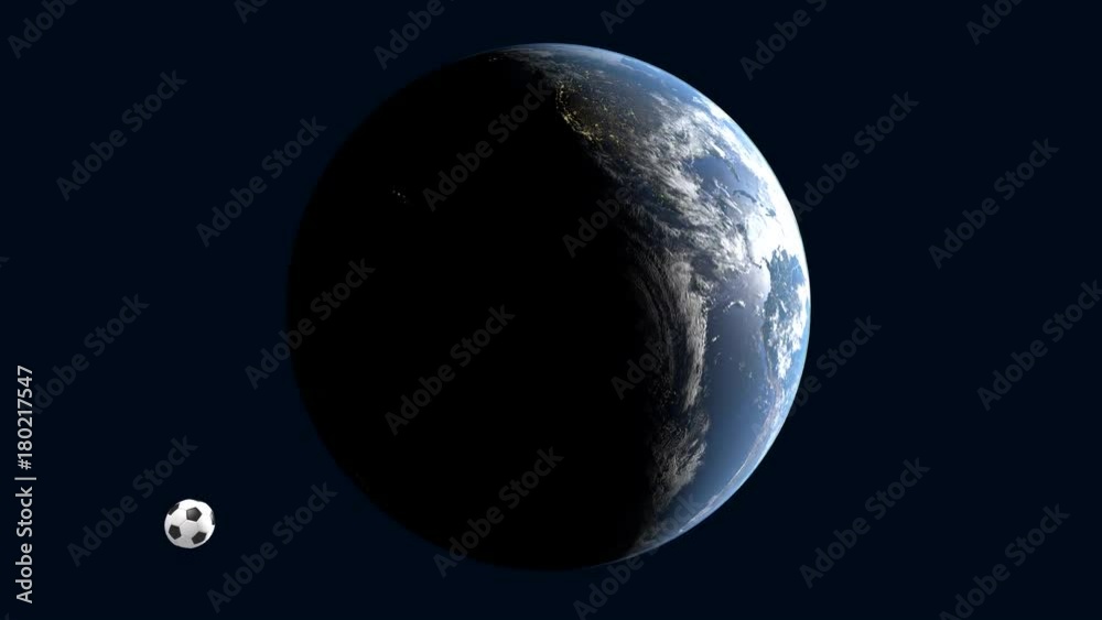 Earth Rotation Table Ball A realistic soccer ball revolves around a rotating earth illuminated ...