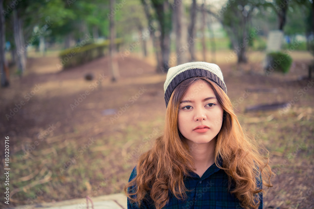 Close up sad beautiful asian woman from unrequire love,she think so much about boyfriend,life without love,heartbreak outdoor concept,vintage style Close up sad beautiful asian woman from unrequire love,she think so much about boyfriend,life without love,heartbreak outdoor concept,vintage style
