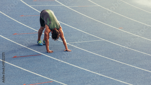 Plakat Sprinter warming up on the track