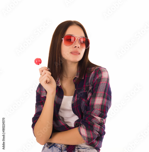 Young cute girl with lollipop, isolated  