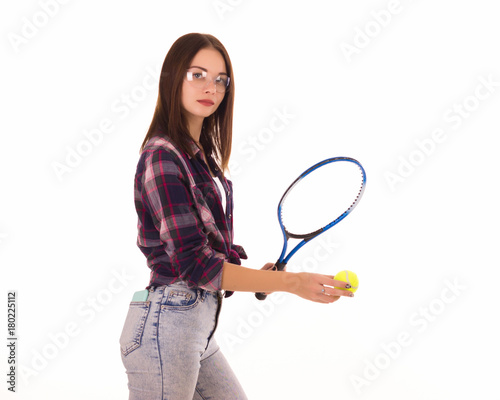 Young cute girl with tennis racket, isolated 