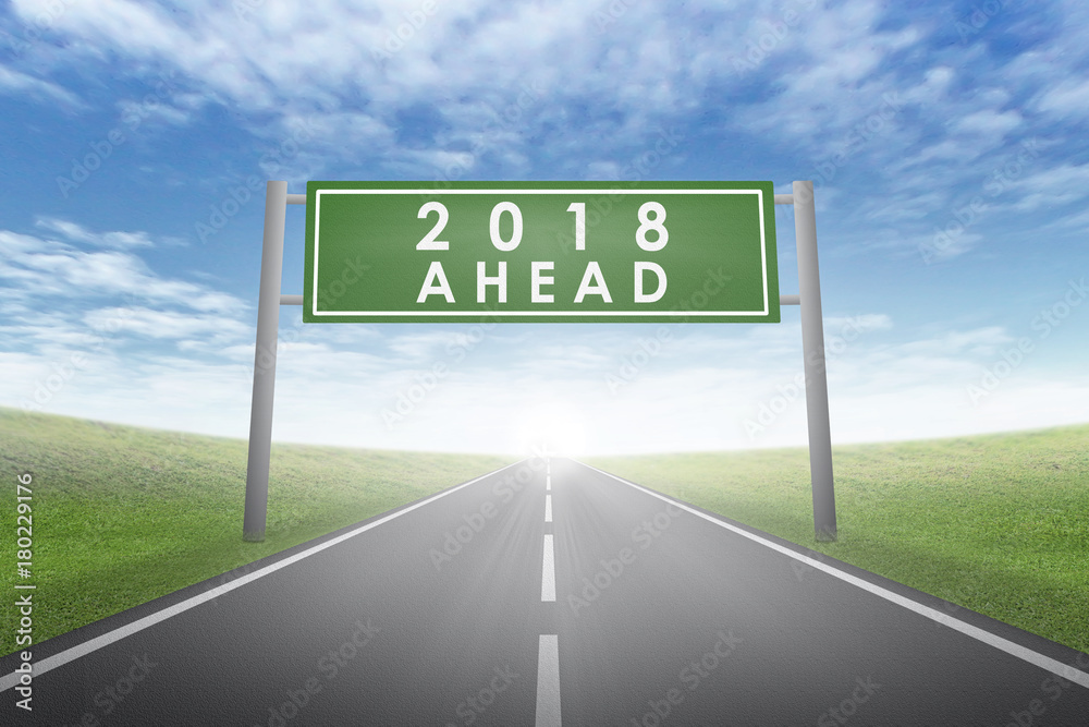 A green notification image with a 2018 ahead with a blue sky background A green notification image with a 2018 ahead with a blue sky background