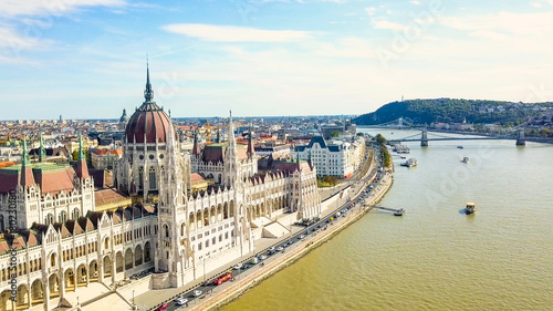 Aerial footage from a drone shows the historical Buda Castle near the Danube on Castle Hill in Budapest, Hungary. Bridge on the river. Aerial view.
