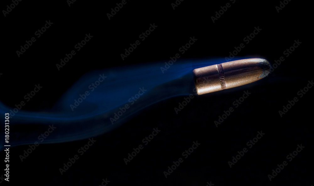 Bullet with smoke behind Bullet with smoke behind