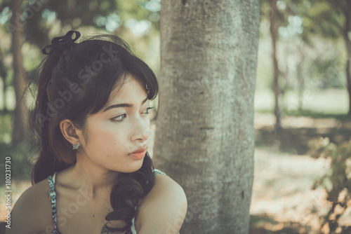 Close up sad beautiful asian woman from unrequire love,she think so much about boyfriend,life without love photo