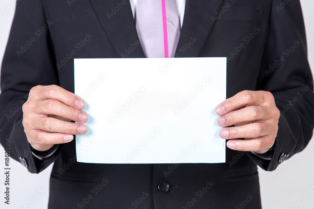 businessman showing a blank white sheet. concept for business businessman showing a blank white sheet. concept for business