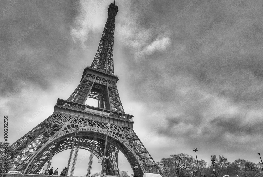 PARIS - DECEMBER 2012: The Eiffel Tower on a cloudy winter day. This is the most visited landmark in France